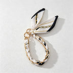 CouldNook Monochrome Scarf Phone Wrist Strap - Neutral Bow Loop