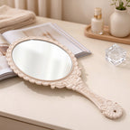 Scalloped Oval Hand Mirror with Ornamental Floral Handle