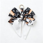 CouldNook 5.51''  Black Series Pattern Bow Bag Charm - Handle Accent