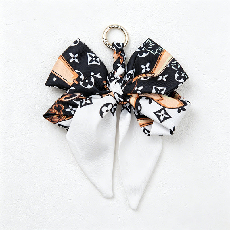 CouldNook 5.51''  Black Series Pattern Bow Bag Charm - Handle Accent