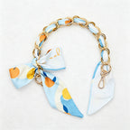 CouldNook 16.54’’ Printed Bow Chain Bag Strap - Soft Accent