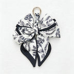 CouldNook 5.51''  Black Series Pattern Bow Bag Charm - Handle Accent