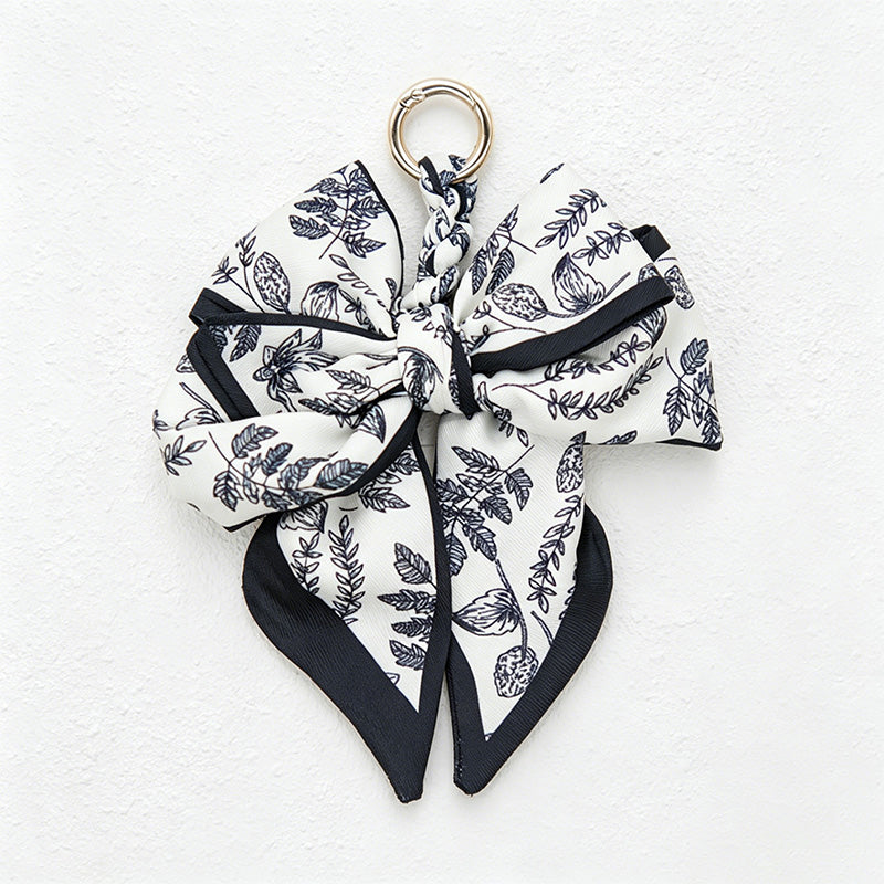 CouldNook 5.51''  Black Series Pattern Bow Bag Charm - Handle Accent