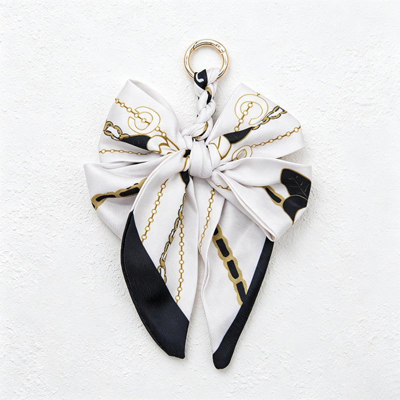 CouldNook 5.51''  Black Series Pattern Bow Bag Charm - Handle Accent