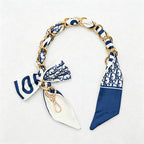 CouldNook 16.54’’ Printed Bow Chain Bag Strap - Soft Accent