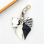 CouldNook 6.69’’ Leaf Pattern Bow Bag Extender - Bag Accent
