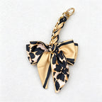 CouldNook 6.69’’ Leaf Pattern Bow Bag Extender - Bag Accent