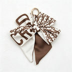 CouldNook 5.51''  Khaki Series Pattern Bow Bag Charm - Handle Accent