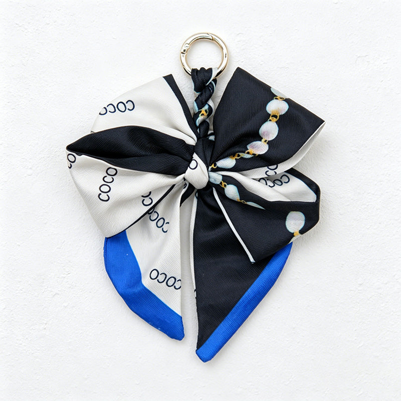 CouldNook 5.51''  Black Series Pattern Bow Bag Charm - Handle Accent