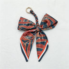 CouldNook Red Series Bow Bag Charm - Soft Bag Accent