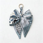 CouldNook 5.51'' Blue Series Pattern Bow Bag Charm - Handle Accent