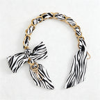 CouldNook 16.54’’ Black Series Printed Bow Chain Bag Strap - Soft Accent