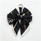 CouldNook 5.51''  Black Series Pattern Bow Bag Charm - Handle Accent