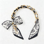 CouldNook 16.54’’ Printed Bow Chain Bag Strap - Soft Accent