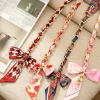 CouldNook 16.54’’ Printed Bow Chain Bag Strap - Soft Accent