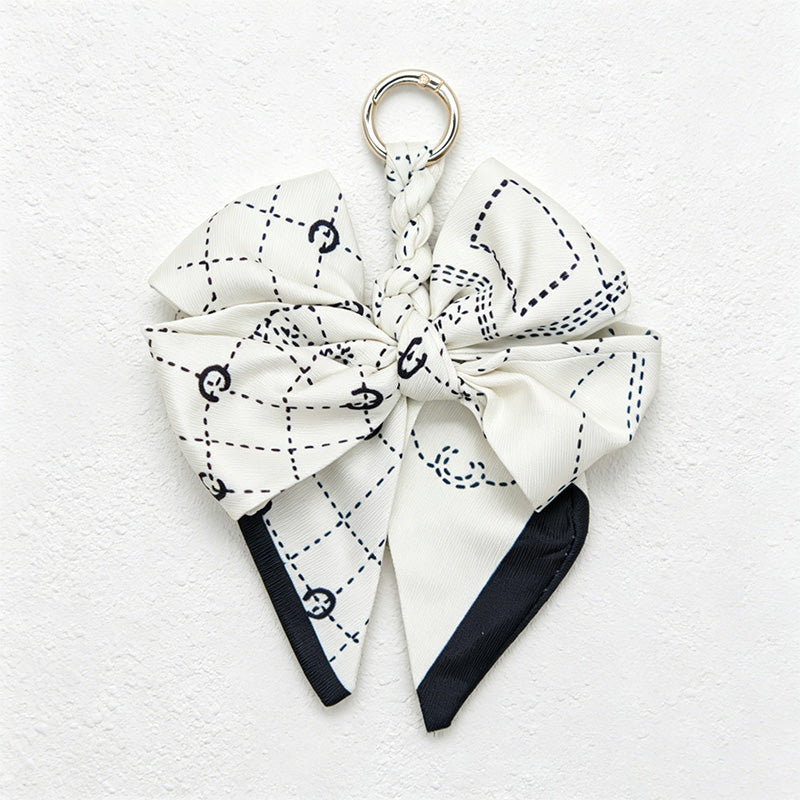 CouldNook 5.51''  Black Series Pattern Bow Bag Charm - Handle Accent