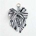 CouldNook 5.51''  Black Series Pattern Bow Bag Charm - Handle Accent