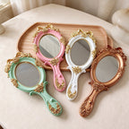 Ornate Oval Hand Mirror with Roses and Bow
