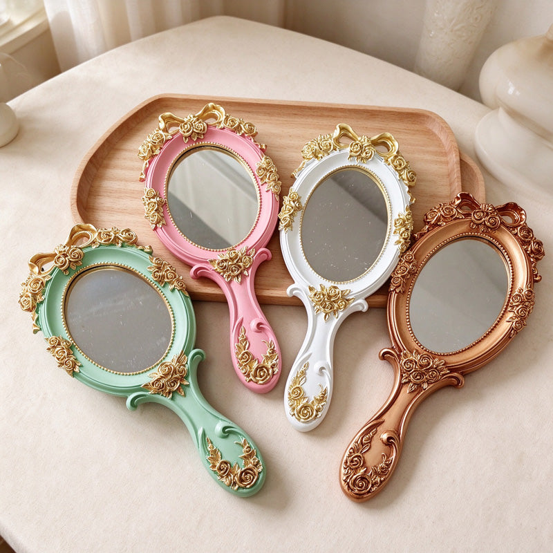 Ornate Oval Hand Mirror with Roses and Bow