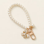 CouldNook Bow and Flower Phone Tab Charm - Pictured motif detailing