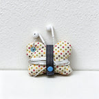 Butterfly Cable Organizer - Patterned Wings and Snap Strap
