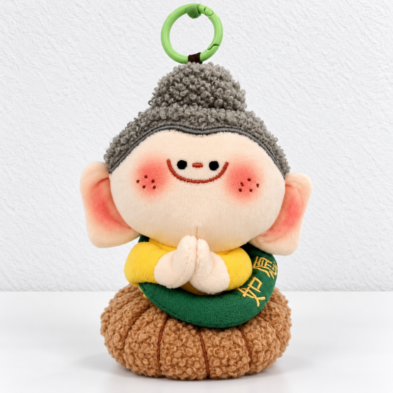CouldNook Plush Buddha Charm - Seated Figure and Folded Hands Detail