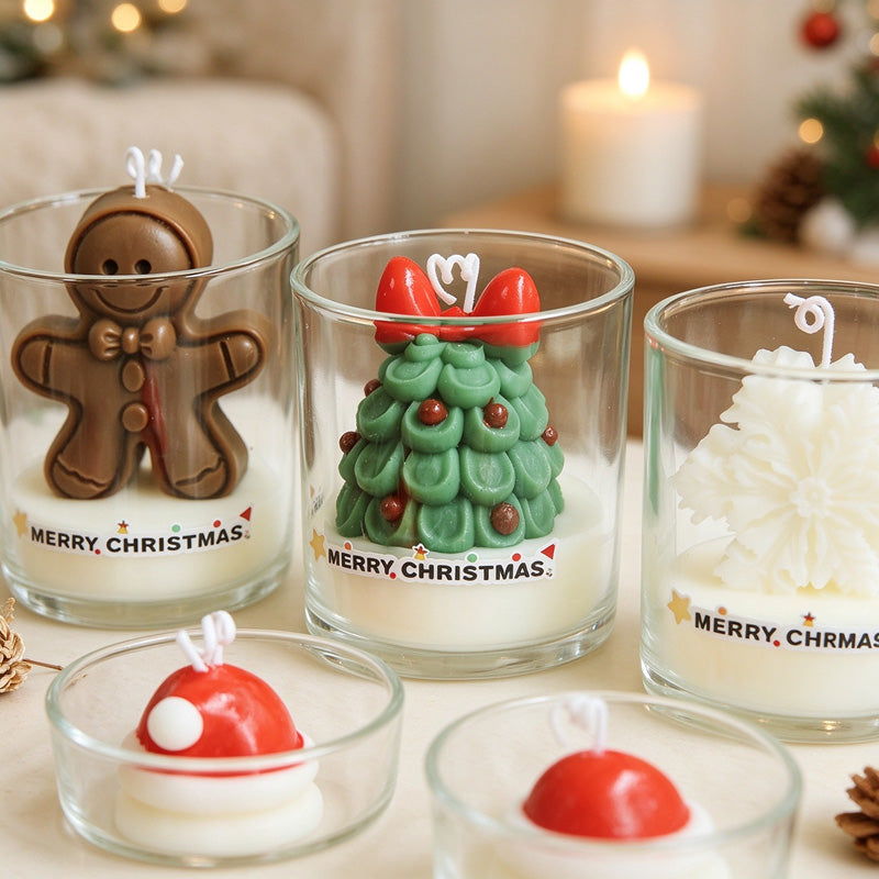 Christmas Scented Candles with Sculpted Figures in Glass