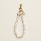 CouldNook Bow and Flower Phone Tab Charm - Pictured motif detailing