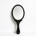 Scalloped Oval Hand Mirror with Ornamental Floral Handle