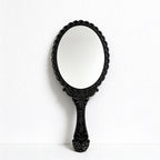 Scalloped Oval Hand Mirror with Ornamental Floral Handle
