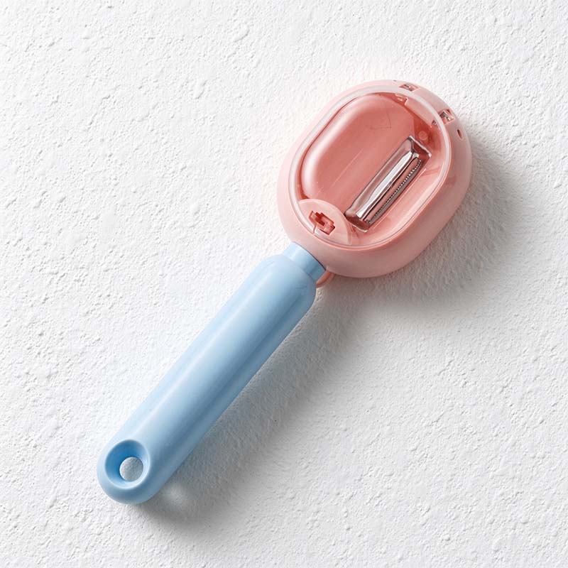 CouldNook Collection Chamber Peeler - Clear Cover and Push-button Release Detail