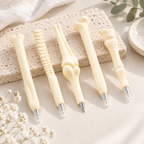 CouldNook Bone-Shaped Ballpoint Pen - Sculpted Joints and Pale Shell