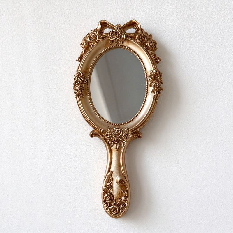 Ornate Oval Hand Mirror with Roses and Bow