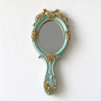 Ornate Oval Hand Mirror with Roses and Bow