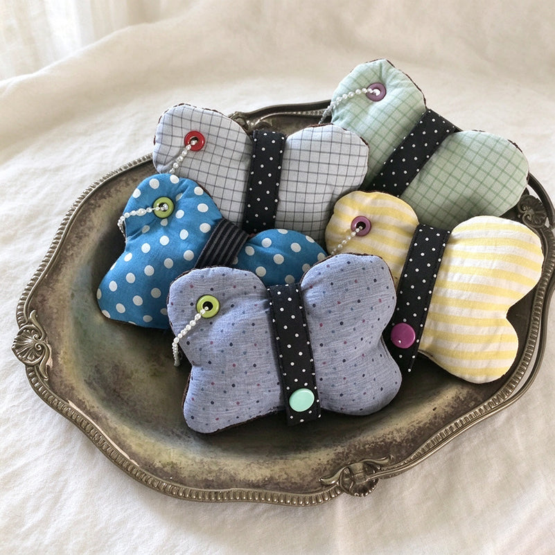 Butterfly Cable Organizer - Patterned Wings and Snap Strap