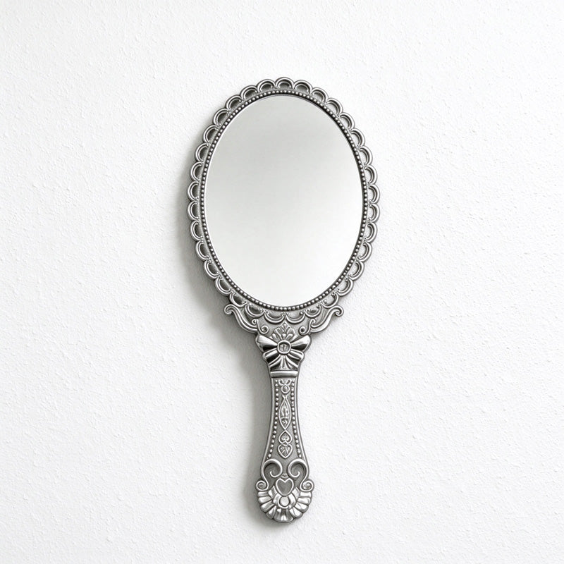 Scalloped Oval Hand Mirror with Ornamental Floral Handle