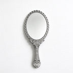 Scalloped Oval Hand Mirror with Ornamental Floral Handle