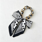 CouldNook Silver Link Scarf Phone Wrist Strap - Monochrome Bow
