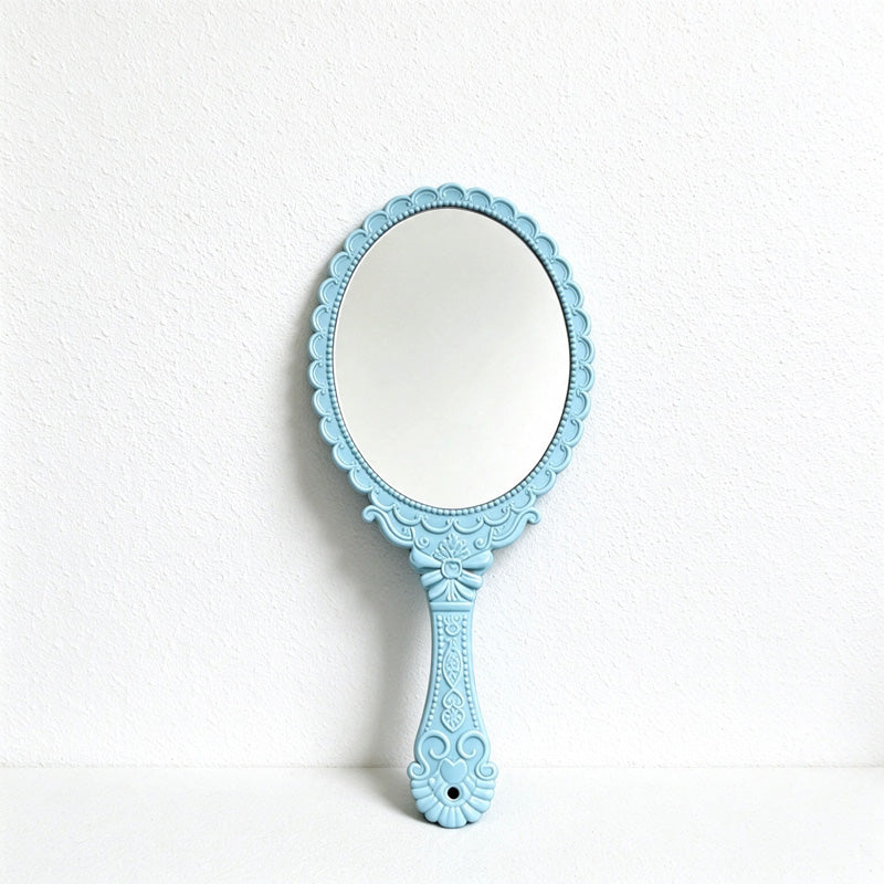Scalloped Oval Hand Mirror with Ornamental Floral Handle