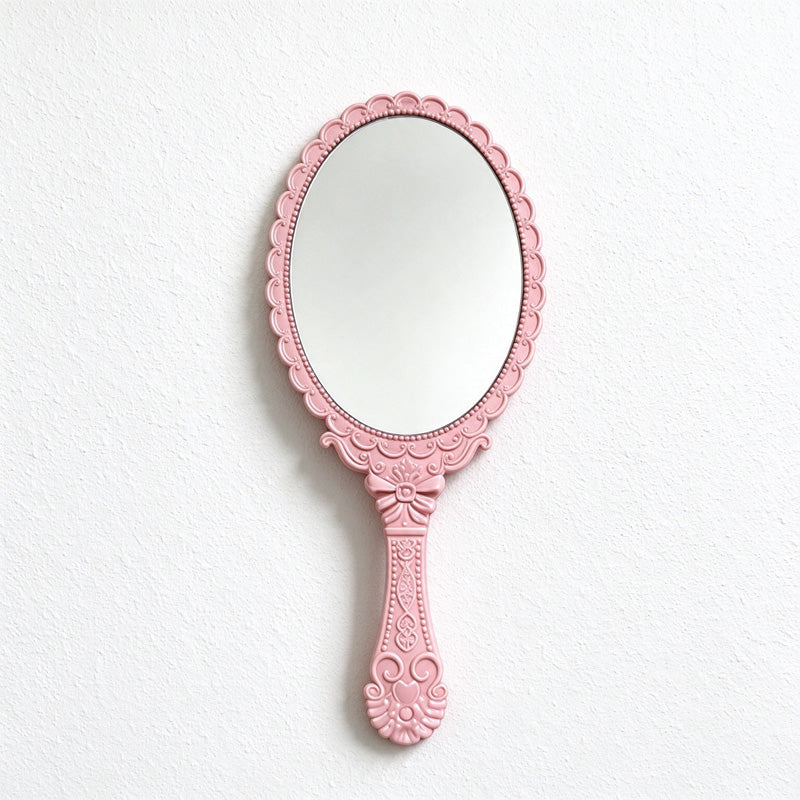 Scalloped Oval Hand Mirror with Ornamental Floral Handle