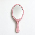 Scalloped Oval Hand Mirror with Ornamental Floral Handle