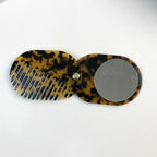 CouldNook Oval Mirror Comb - Patterned Acetate and Gold-tone Swivel Pivot