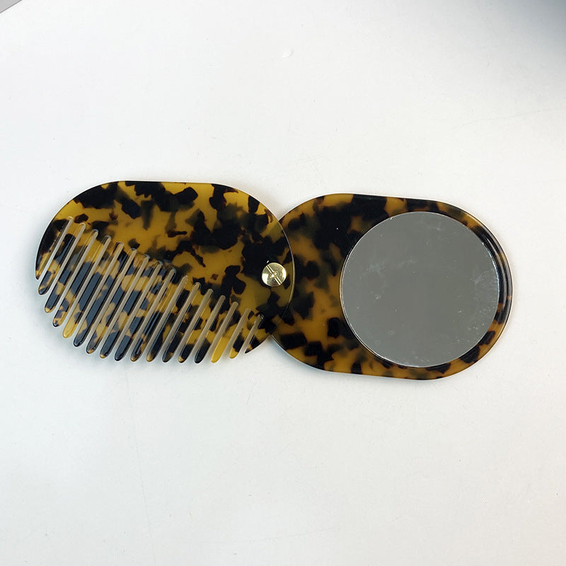 CouldNook Oval Mirror Comb - Patterned Acetate and Gold-tone Swivel Pivot