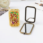 CouldNook Decorative Folding Pocket Mirror - Raised Peacock Motifs And Metal Frame