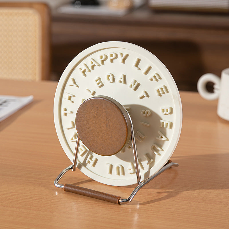 CouldNook Lettered Silicone Trivet - Raised Words And Round Tabletop Shape