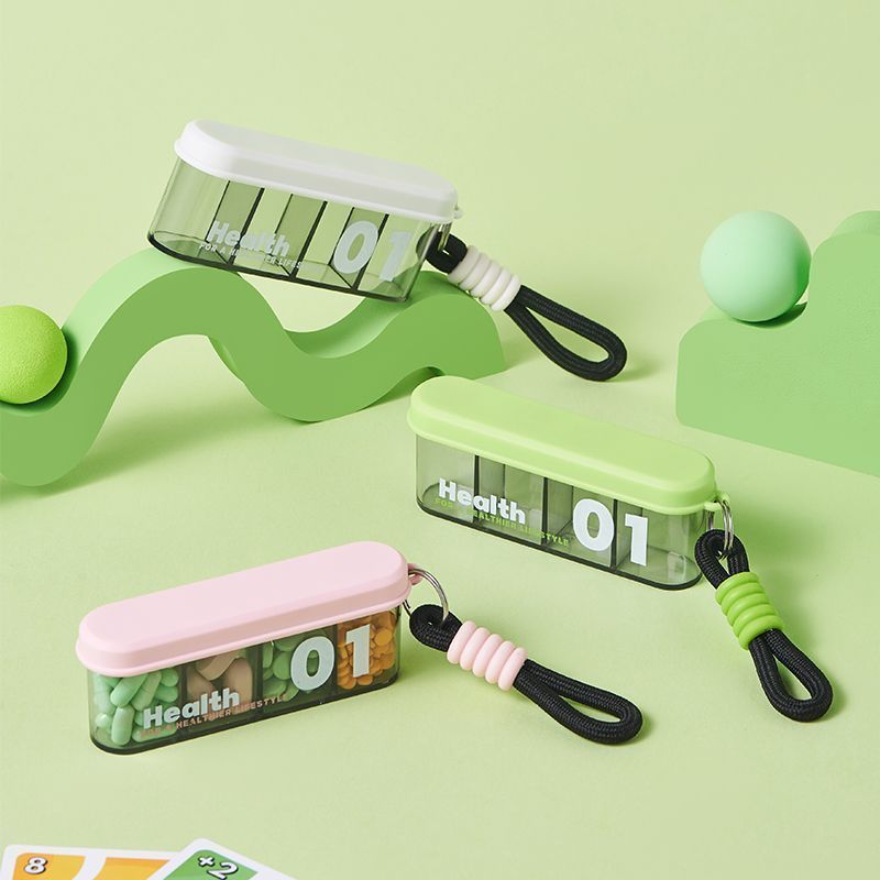 CouldNook Slim Pill Organizer - Divided Interior And Wrist Loop