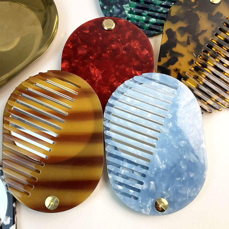 CouldNook Oval Mirror Comb - Patterned Acetate and Gold-tone Swivel Pivot