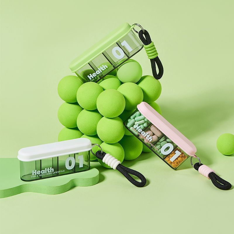 CouldNook Slim Pill Organizer - Divided Interior And Wrist Loop