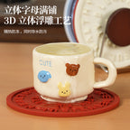 CouldNook Lettered Silicone Trivet - Raised Words And Round Tabletop Shape