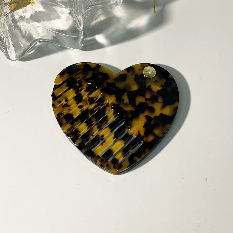 CouldNook Heart Mirror Comb - Marbled Acetate and Swivel Opening Detail